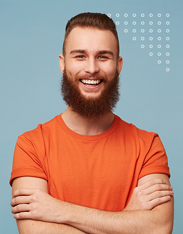 a man with a beard and orange shirt.